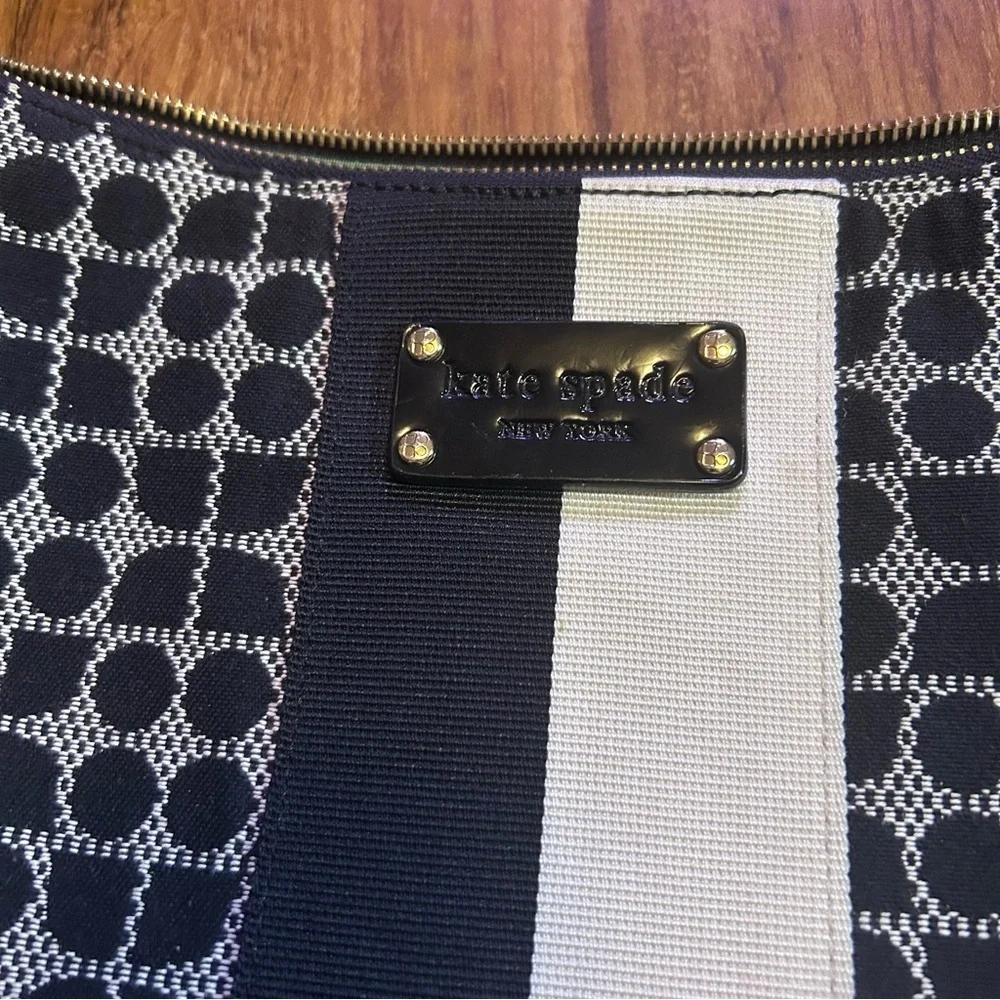 Kate Spade Penn Place Keisha crossbody bag in a black and white dot pattern